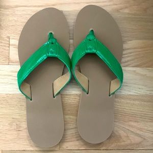Eliza B. flip flops